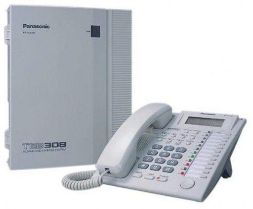 EPABX with system phone - Wired exchange linking the gate, guard room and every floor.